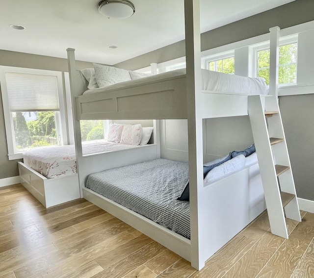 bedroom with hardwood / wood-style flooring