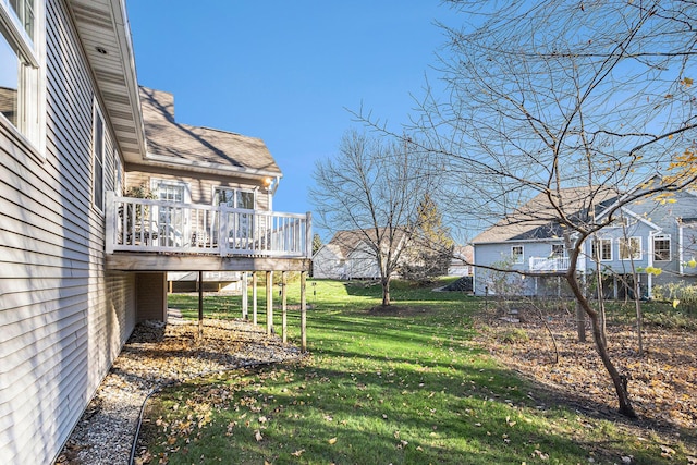 view of yard with a wooden deck