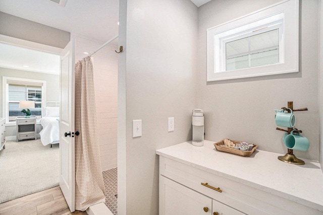 bathroom featuring a shower with shower curtain