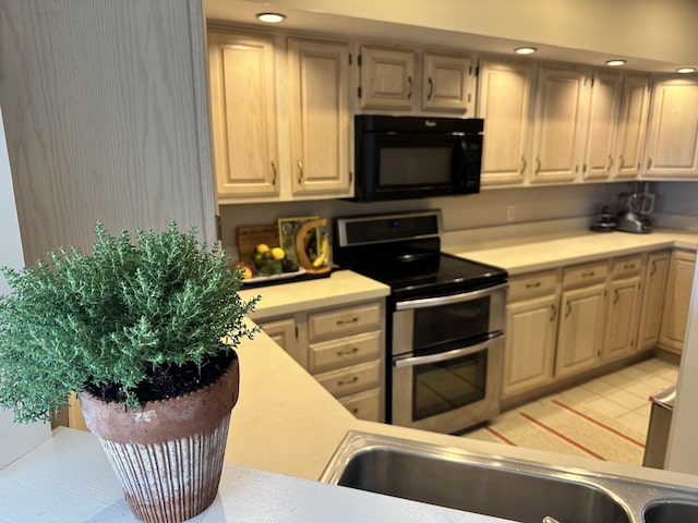 kitchen featuring double oven range