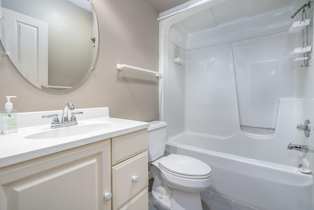 full bathroom with vanity, toilet, washtub / shower combination, and tile patterned flooring