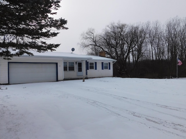 single story home with a garage