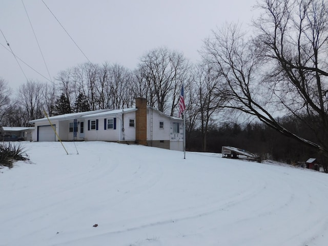 exterior space with a garage