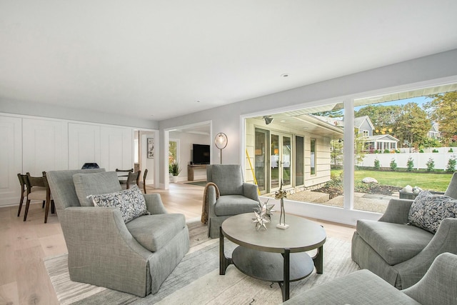 living room with light hardwood / wood-style floors