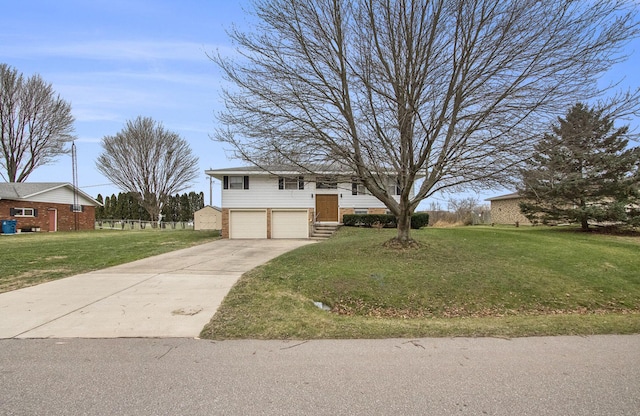 view of front of property with a garage and a front lawn