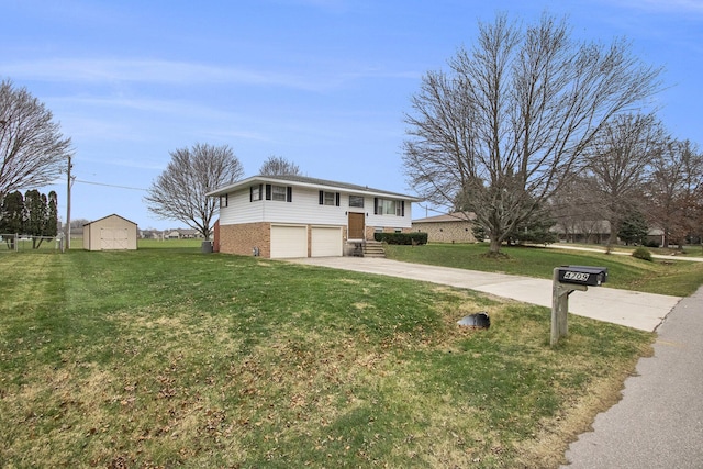 bi-level home featuring a front yard and a garage