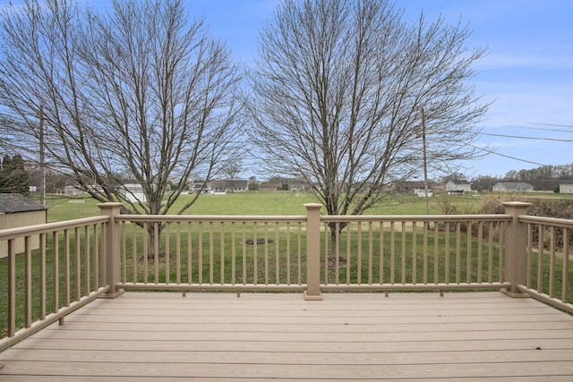 deck featuring a yard