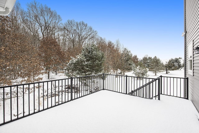 view of snow covered deck