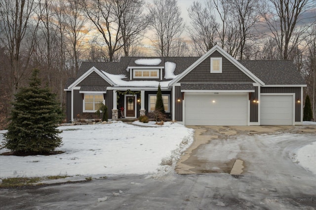 craftsman inspired home with a garage