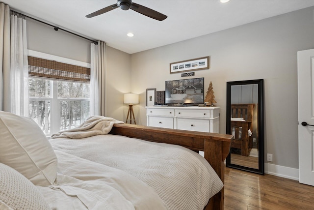 bedroom featuring ceiling fan and wood-type flooring