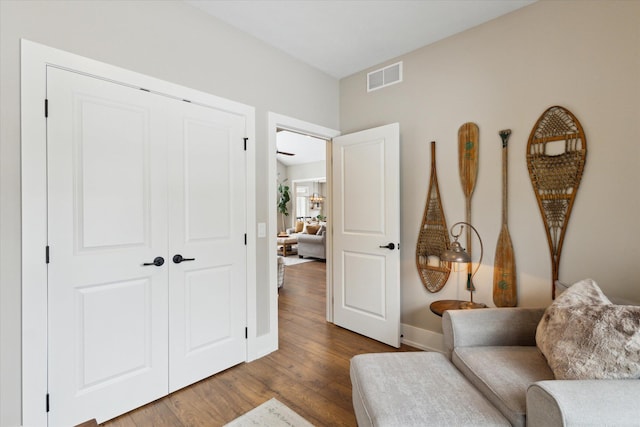 living area featuring hardwood / wood-style floors