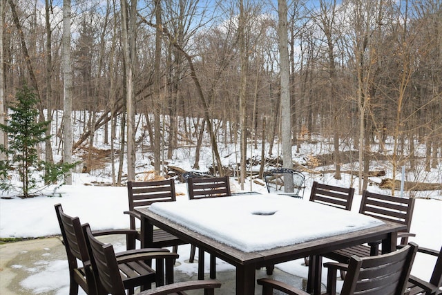 view of snow covered deck