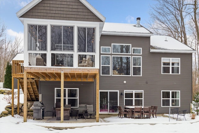 view of snow covered property