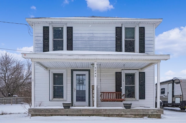 view of front of property featuring covered porch