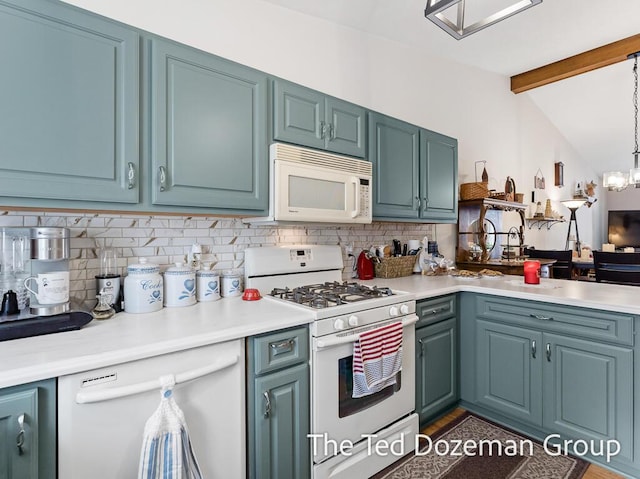 kitchen featuring decorative light fixtures, lofted ceiling with beams, backsplash, white appliances, and an inviting chandelier