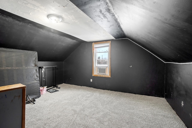 bonus room with cooling unit, lofted ceiling, and carpet