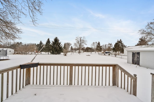 view of snow covered deck