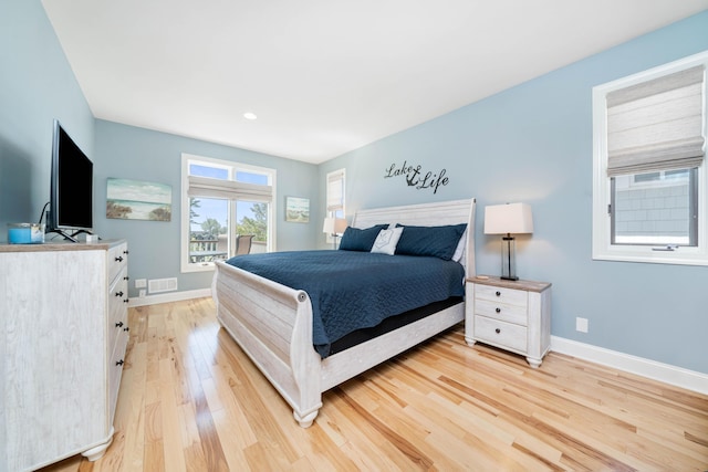 bedroom featuring light hardwood / wood-style flooring