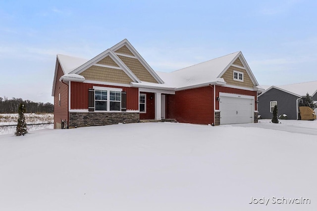 craftsman-style home with a garage