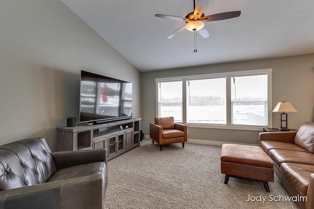 carpeted living room with lofted ceiling and ceiling fan