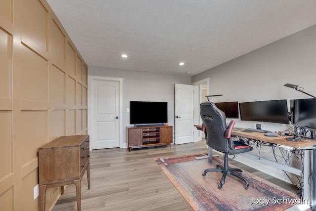 office featuring light wood-style flooring and recessed lighting