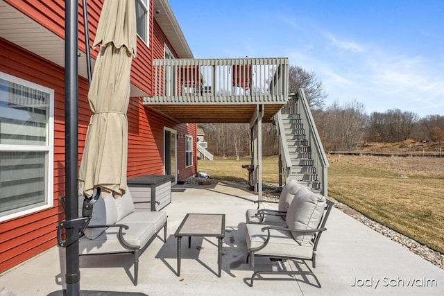 view of patio / terrace with outdoor lounge area and stairs