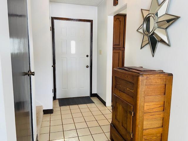 view of tiled foyer