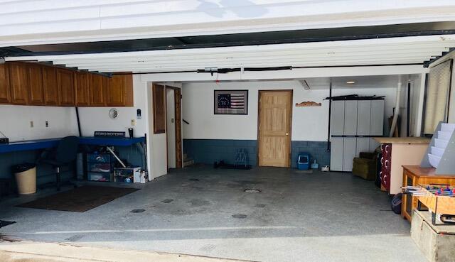 garage featuring a carport