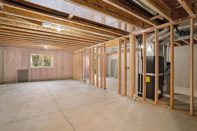 basement featuring heating unit