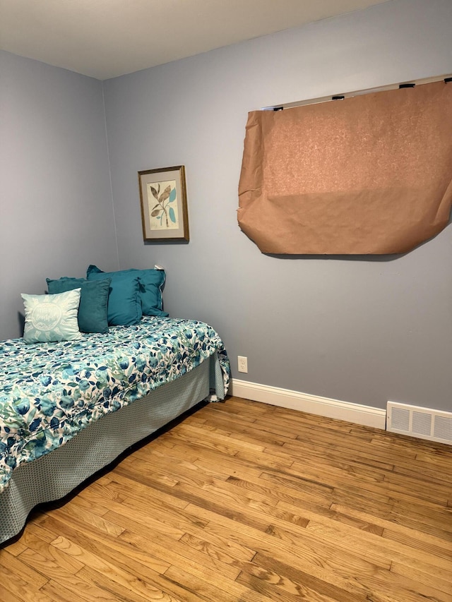 bedroom featuring light hardwood / wood-style flooring