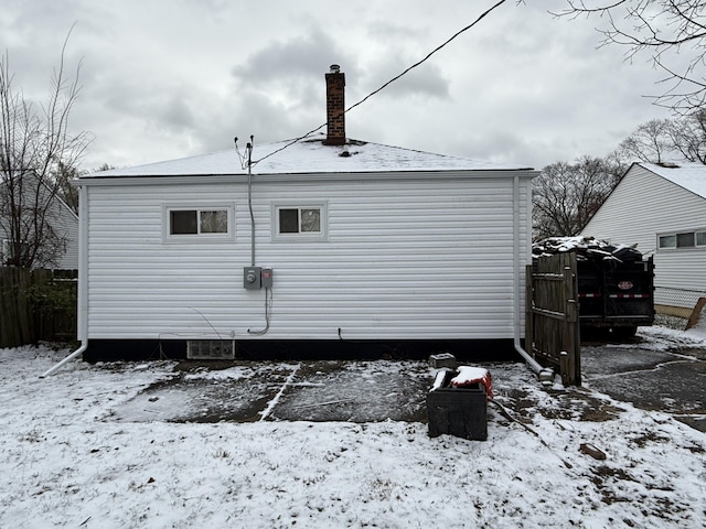 view of snow covered property