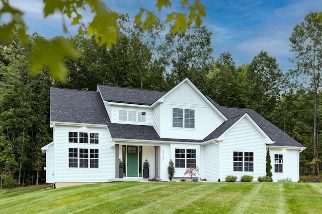 view of front of property with a front lawn