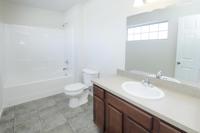 full bathroom featuring tile patterned flooring, vanity, toilet, and washtub / shower combination