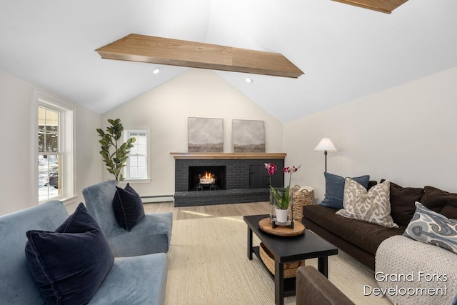 living room featuring a baseboard radiator, lofted ceiling with beams, a brick fireplace, and light hardwood / wood-style flooring