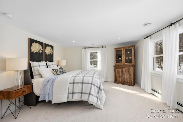 bedroom featuring light carpet