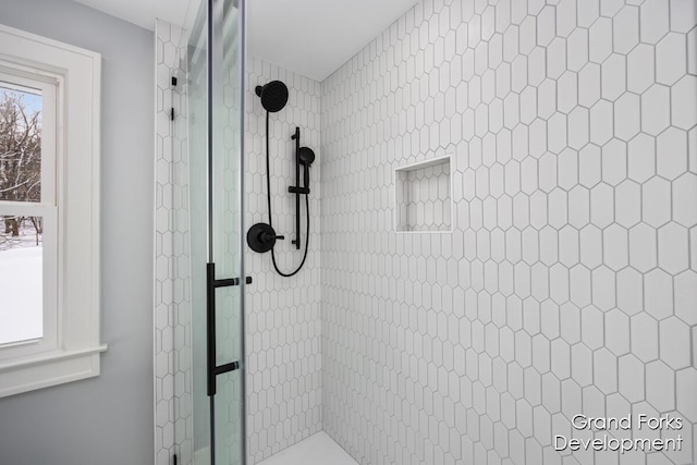 bathroom featuring walk in shower