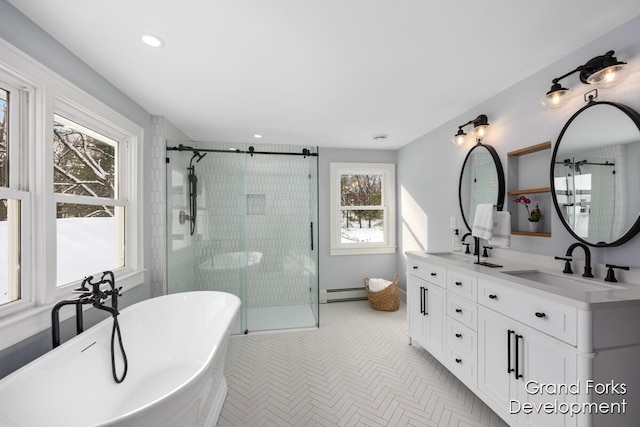 bathroom with a baseboard radiator, vanity, separate shower and tub, and tile patterned floors