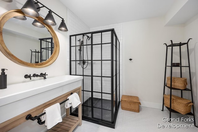 bathroom featuring tile patterned floors and a tile shower