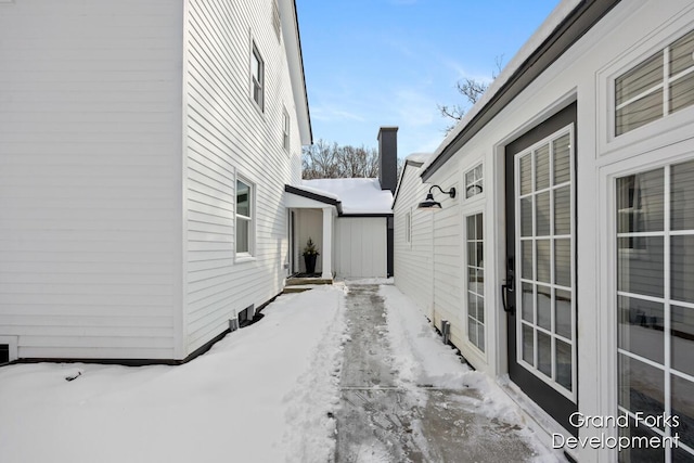 view of snow covered property