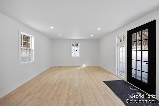 foyer entrance featuring light hardwood / wood-style flooring