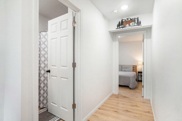 hall featuring light wood-type flooring