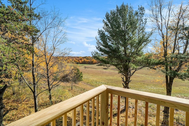 wooden terrace with a rural view