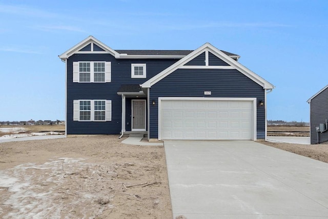 view of front of property featuring a garage