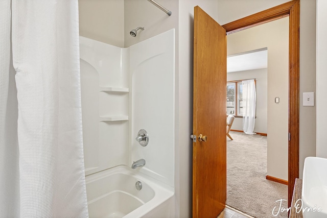 bathroom featuring shower / bathtub combination with curtain