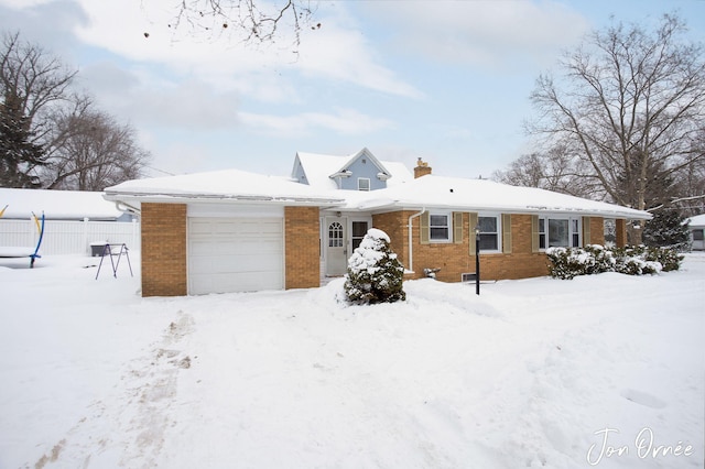 view of front of home with a garage