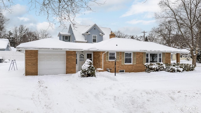 view of front of home with a garage