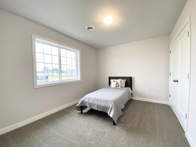 bedroom featuring carpet