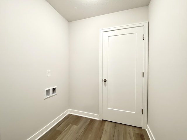 laundry room with hookup for a washing machine and hardwood / wood-style floors