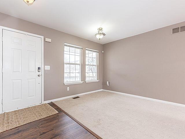 foyer featuring hardwood / wood-style flooring