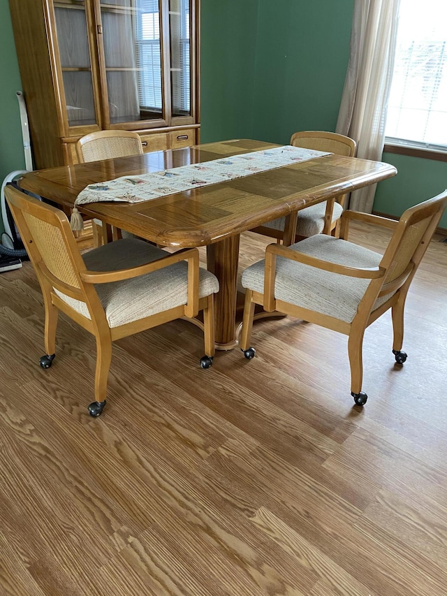 dining room featuring light hardwood / wood-style flooring